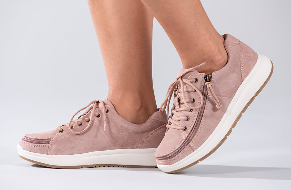 Women's Blush Suede BILLY Comfort Lows, zipper shoes, like velcro, that are adaptive, accessible, inclusive and use universal design to accommodate an afo. Footwear is medium and wide width, M, D and EEE, are comfortable, and come in toddler, kids, mens, and womens sizing.
