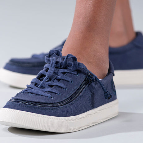 Kid's Navy BILLY Sustainable Lace Lows, zipper shoes, like velcro, that are adaptive, accessible, inclusive and use universal design to accommodate an afo. BILLY Footwear has medium and wide width, M, D and EEE, are comfortable, and come in toddler, kids, mens, and womens sizing.