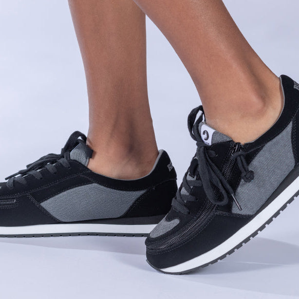 Kid's Black/Charcoal BILLY Joggers, zipper shoes, like velcro, that are adaptive, accessible, inclusive and use universal design to accommodate an afo. BILLY Footwear is medium and wide width, M, D and EEE, are comfortable, and come in toddler, kids, mens, and womens sizing.