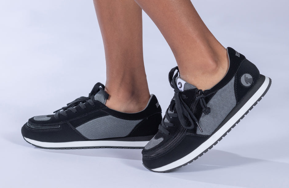 Kid's Black/Charcoal BILLY Joggers, zipper shoes, like velcro, that are adaptive, accessible, inclusive and use universal design to accommodate an afo. BILLY Footwear is medium and wide width, M, D and EEE, are comfortable, and come in toddler, kids, mens, and womens sizing.