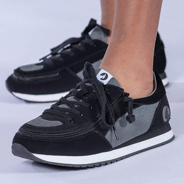 Kid's Black/Charcoal BILLY Joggers, zipper shoes, like velcro, that are adaptive, accessible, inclusive and use universal design to accommodate an afo. BILLY Footwear is medium and wide width, M, D and EEE, are comfortable, and come in toddler, kids, mens, and womens sizing.