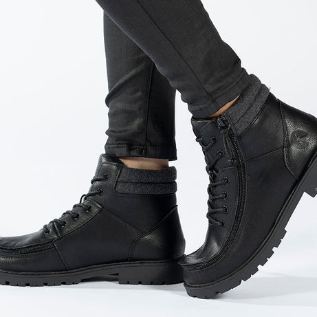 Kid's Black BILLY Lugs, zipper shoes, like velcro, that are adaptive, accessible, inclusive and use universal design to accommodate an afo. BILLY Footwear comes in medium and wide width, M, D and EEE, are comfortable, and come in toddler, kids, mens, and womens sizing.