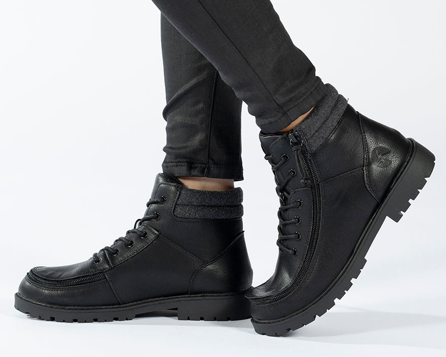 Kid's Black BILLY Lugs, zipper shoes, like velcro, that are adaptive, accessible, inclusive and use universal design to accommodate an afo. BILLY Footwear comes in medium and wide width, M, D and EEE, are comfortable, and come in toddler, kids, mens, and womens sizing.