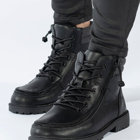 Kid's Black BILLY Lugs, zipper shoes, like velcro, that are adaptive, accessible, inclusive and use universal design to accommodate an afo. BILLY Footwear comes in medium and wide width, M, D and EEE, are comfortable, and come in toddler, kids, mens, and womens sizing.