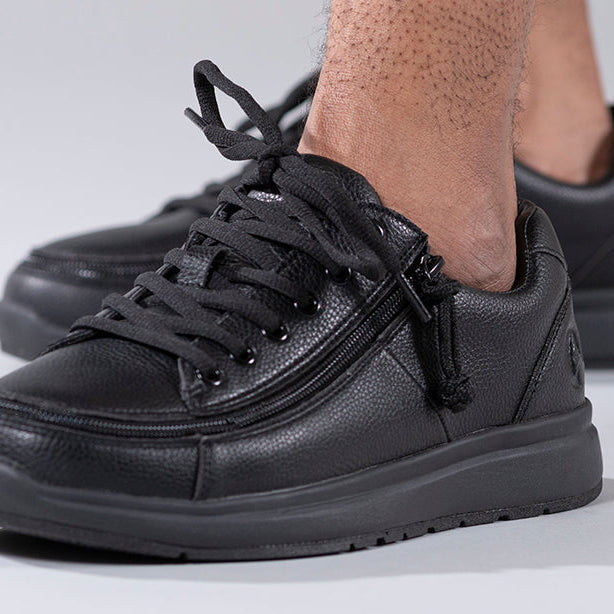 Men's Black to the Floor BILLY Work Comfort Lows, zipper shoes, like velcro, that are adaptive, accessible, inclusive and use universal design to accommodate an afo. Footwear is medium and wide width, M, D and EEE, are comfortable, and come in toddler, kids, mens, and womens sizing.