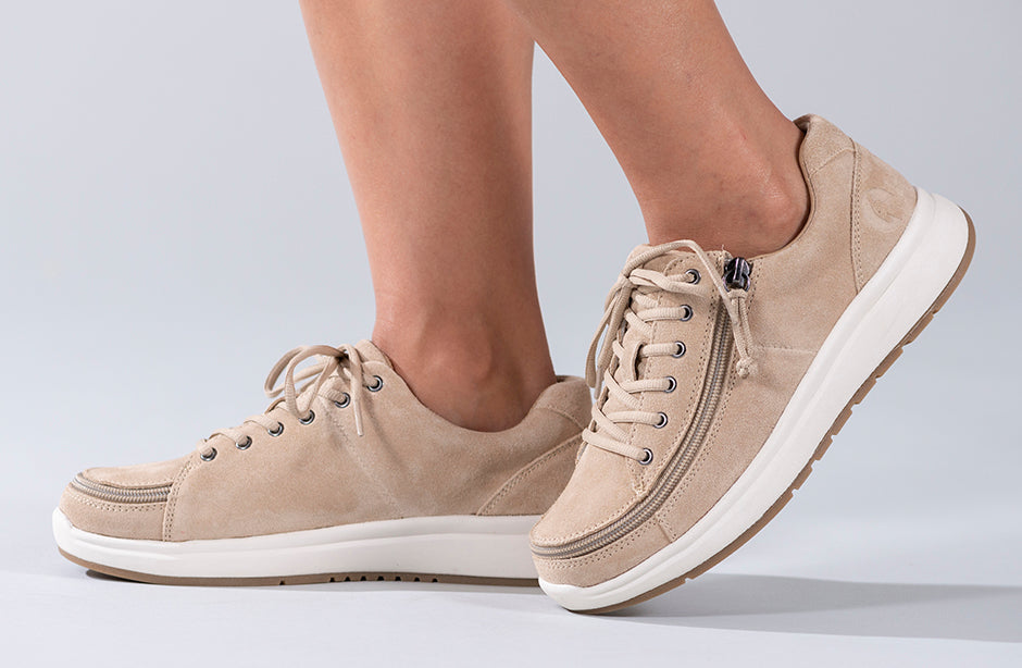 Women's Tan Suede BILLY Comfort Lows, zipper shoes, like velcro, that are adaptive, accessible, inclusive and use universal design to accommodate an afo. Footwear is medium and wide width, M, D and EEE, are comfortable, and come in toddler, kids, mens, and womens sizing.