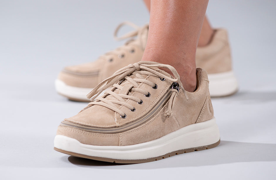 Women's Tan Suede BILLY Comfort Lows, zipper shoes, like velcro, that are adaptive, accessible, inclusive and use universal design to accommodate an afo. Footwear is medium and wide width, M, D and EEE, are comfortable, and come in toddler, kids, mens, and womens sizing.