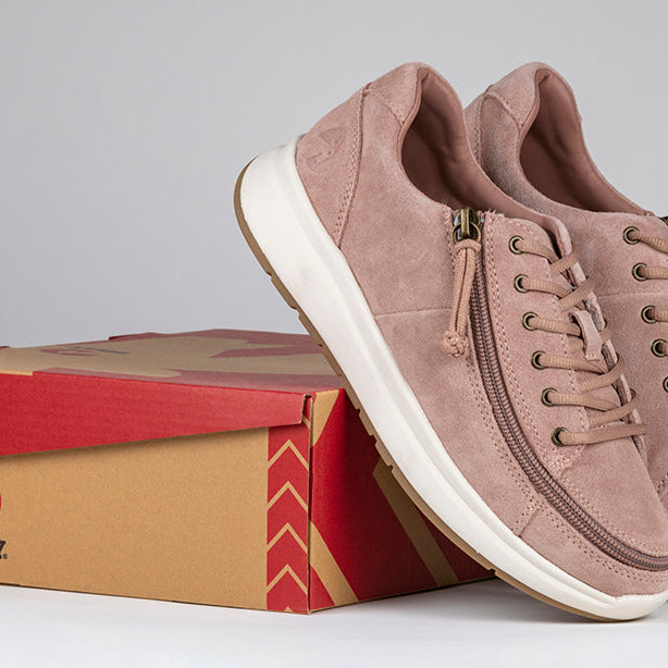 Women's Blush Suede BILLY Comfort Lows, zipper shoes, like velcro, that are adaptive, accessible, inclusive and use universal design to accommodate an afo. Footwear is medium and wide width, M, D and EEE, are comfortable, and come in toddler, kids, mens, and womens sizing.