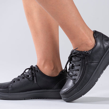Women's Black to the Floor BILLY Work Comfort Lows, zipper shoes, like velcro, that are adaptive, accessible, inclusive and use universal design to accommodate an afo. Footwear is medium and wide width, M, D and EEE, are comfortable, and come in toddler, kids, mens, and womens sizing.