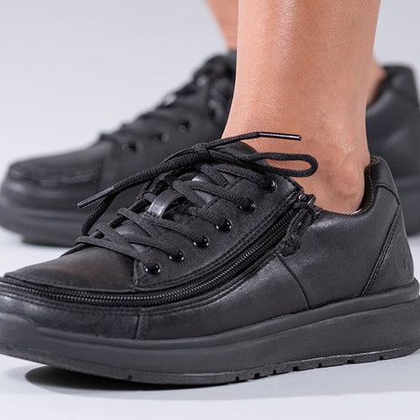 Women's Black to the Floor BILLY Work Comfort Lows, zipper shoes, like velcro, that are adaptive, accessible, inclusive and use universal design to accommodate an afo. Footwear is medium and wide width, M, D and EEE, are comfortable, and come in toddler, kids, mens, and womens sizing.