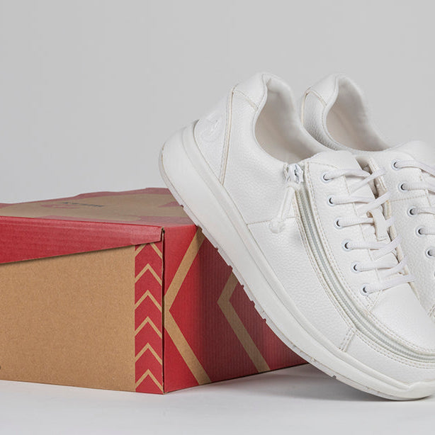 Women's White BILLY Work Comfort Lows, zipper shoes, like velcro, that are adaptive, accessible, inclusive and use universal design to accommodate an afo. Footwear is medium and wide width, M, D and EEE, are comfortable, and come in toddler, kids, mens, and womens sizing.