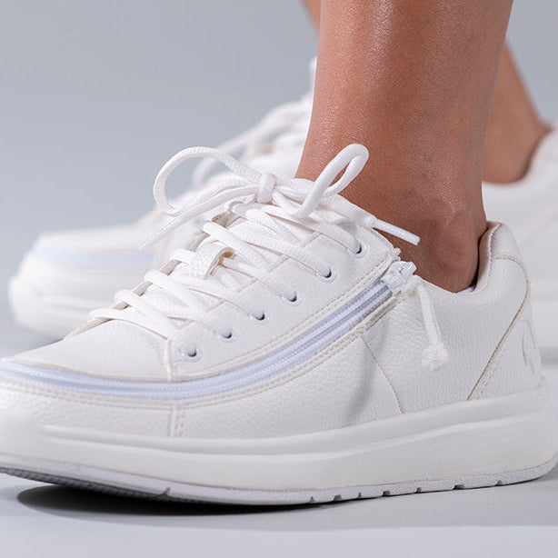 Women's White BILLY Work Comfort Lows, zipper shoes, like velcro, that are adaptive, accessible, inclusive and use universal design to accommodate an afo. Footwear is medium and wide width, M, D and EEE, are comfortable, and come in toddler, kids, mens, and womens sizing.